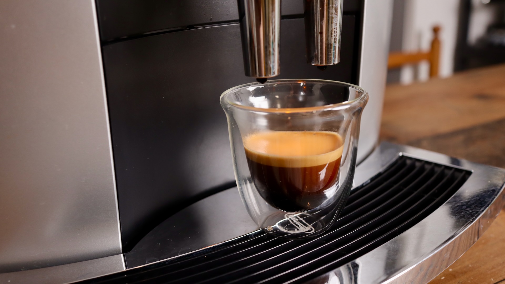 Closeup of a finished espresso shot on the Jura E8 espresso machine