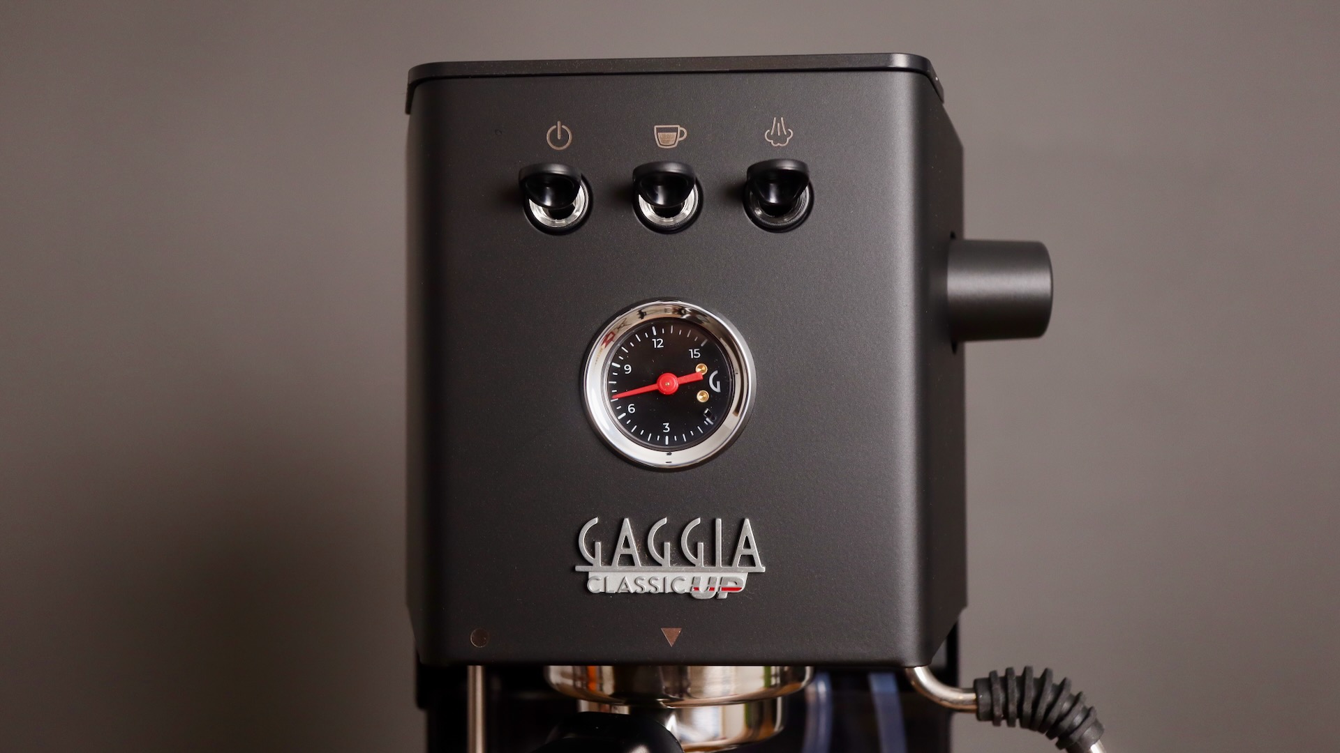 Switches, manometer and logo of Gaggia Classic Up